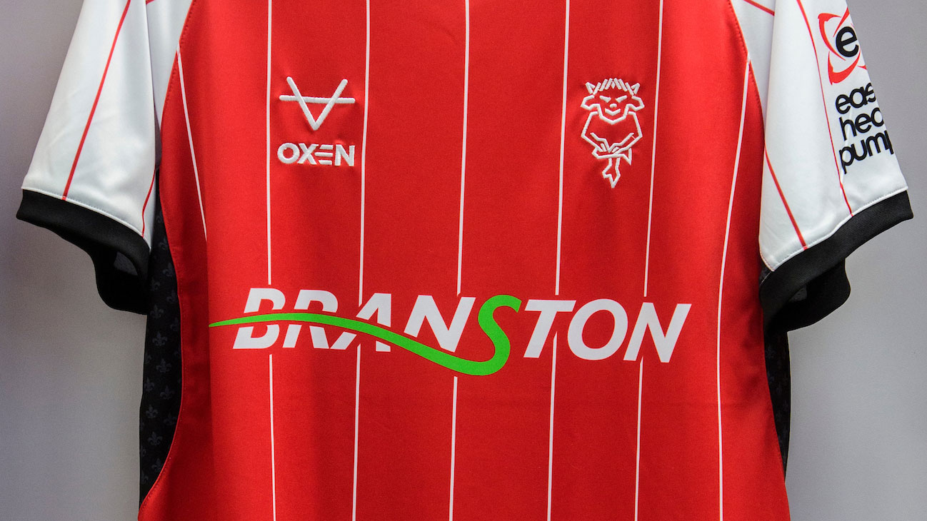 A photo of the front of City's new home shirt which displays Branston.