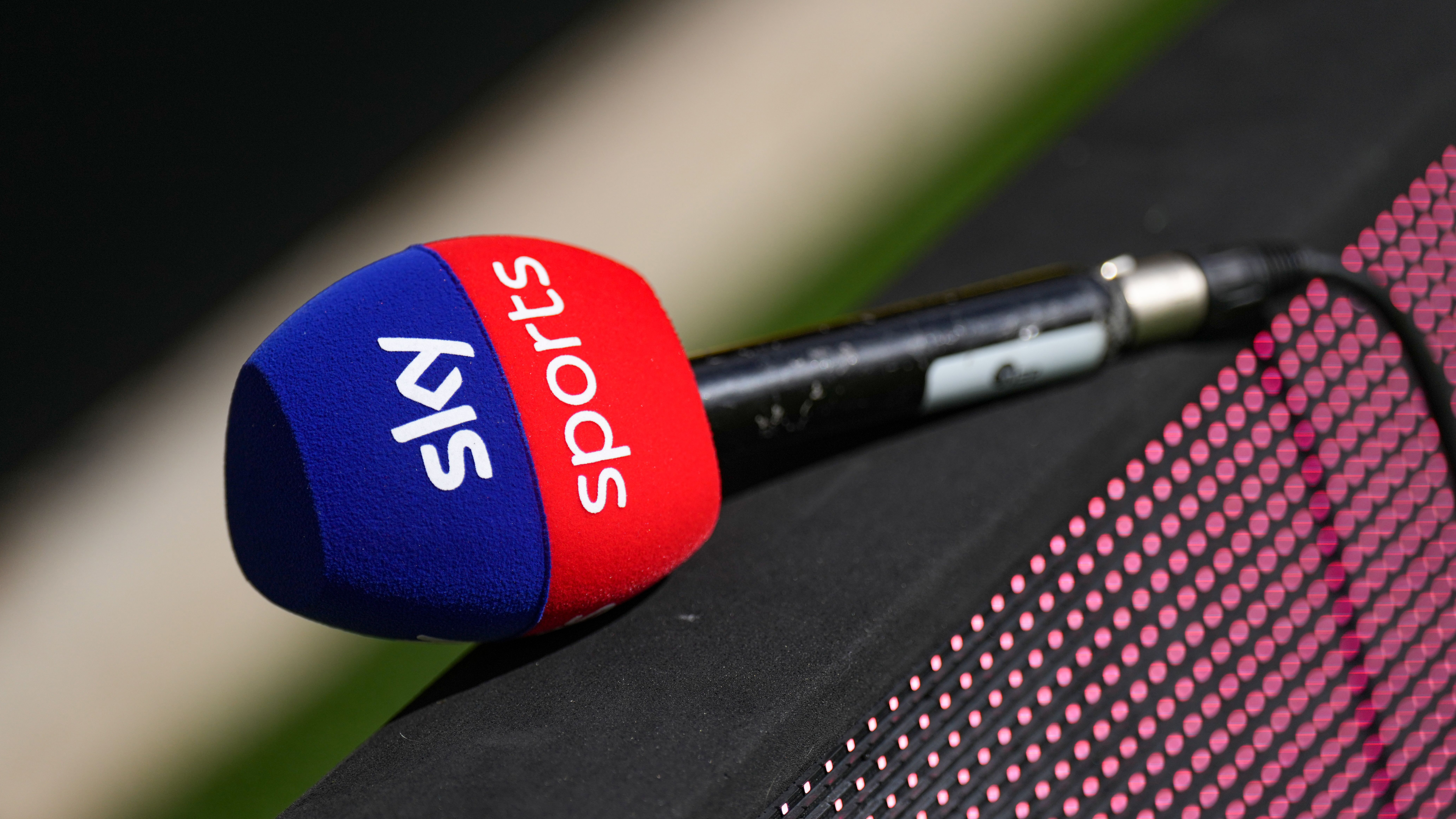 A microphone with Sky Sports branding