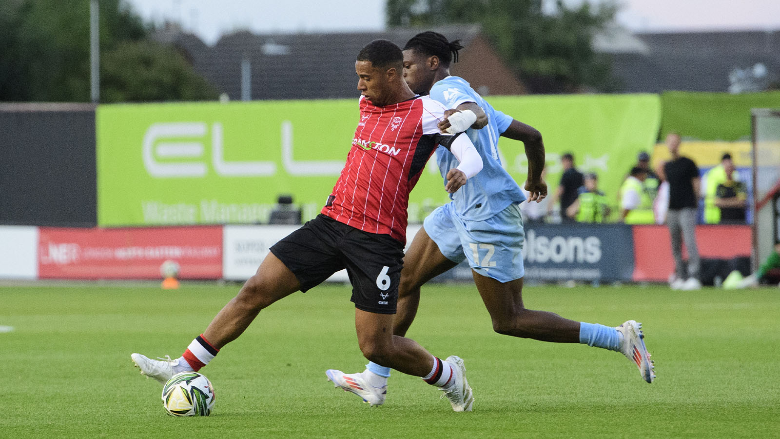 Ethan Erhahon in action for Lincoln City against Harrogate Town.