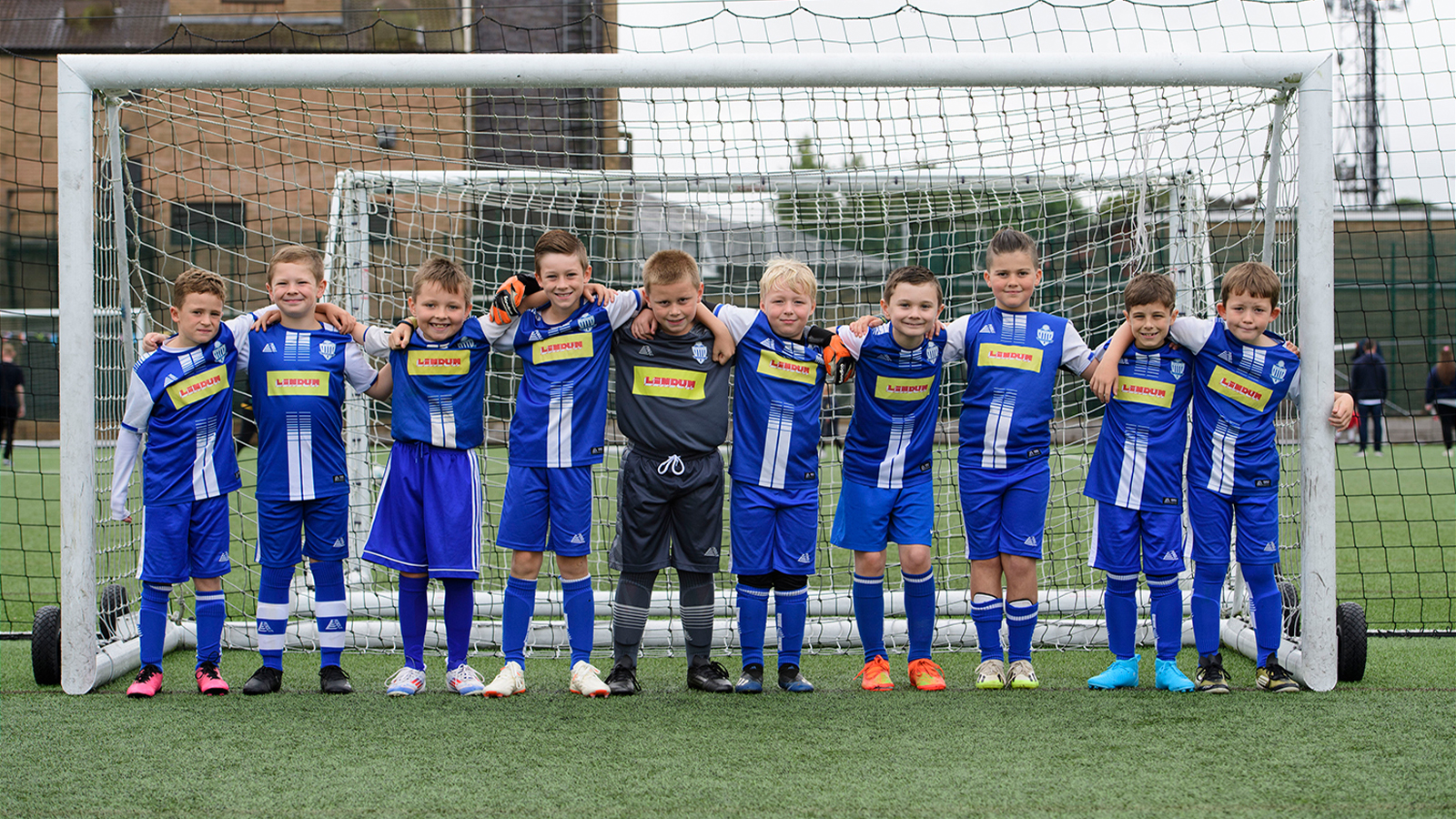 Lowlands JFC U9’s pose for a photo on the 3G pitch at the LNER Stadium