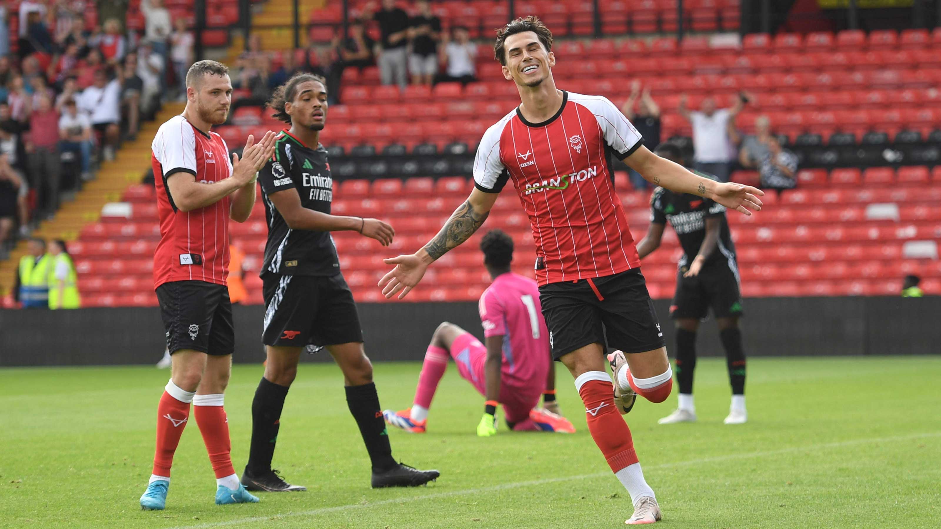 Lewis Montsma celebrates his goal against Arsenal U21.