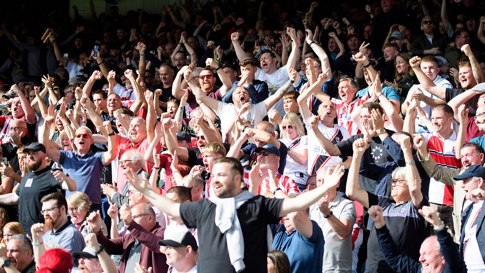 City's fans get behind their team at Peterborough United.