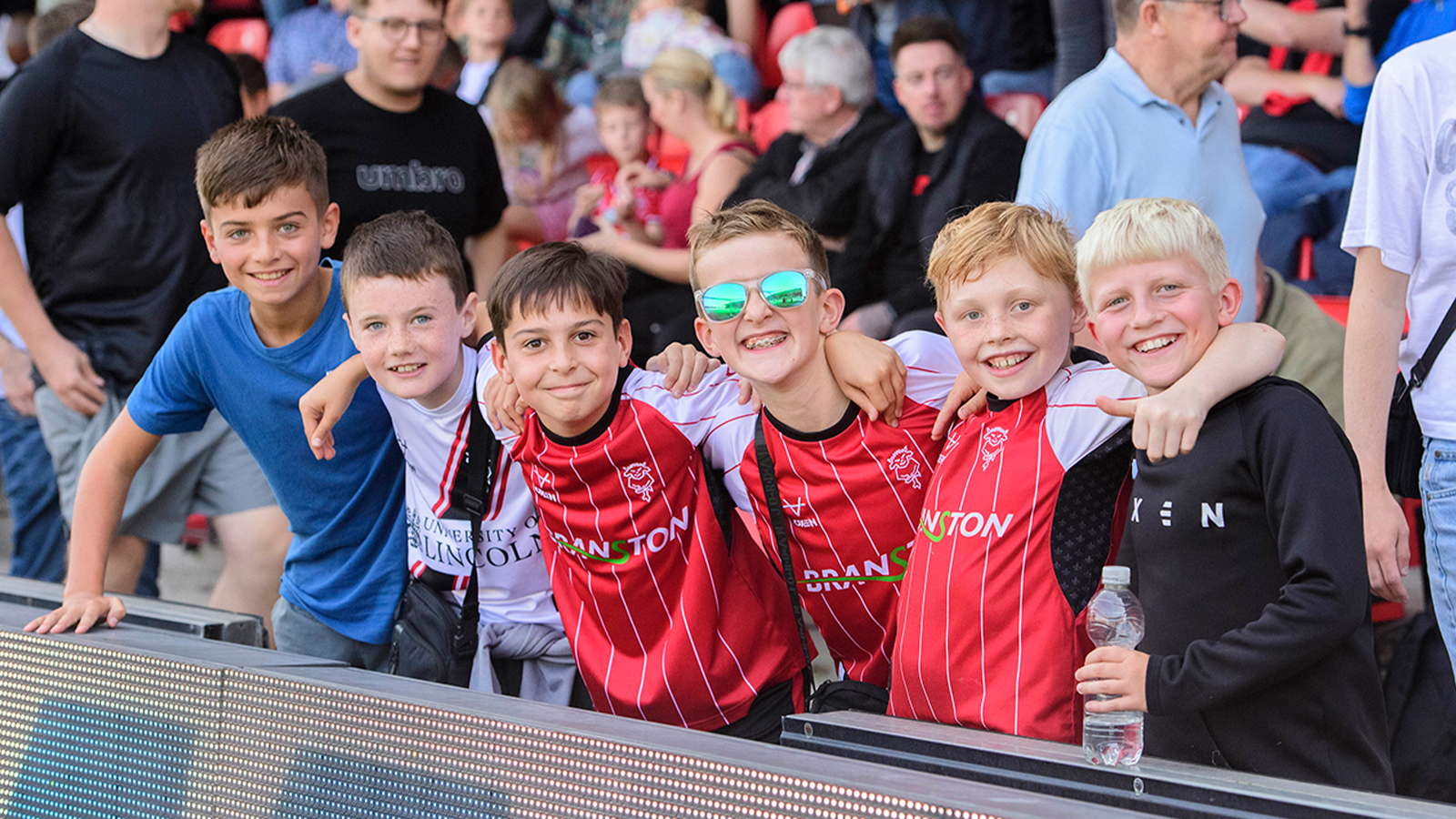 An image of young supporters from Lincoln City's 0-0 home draw against Wigan Athletic.