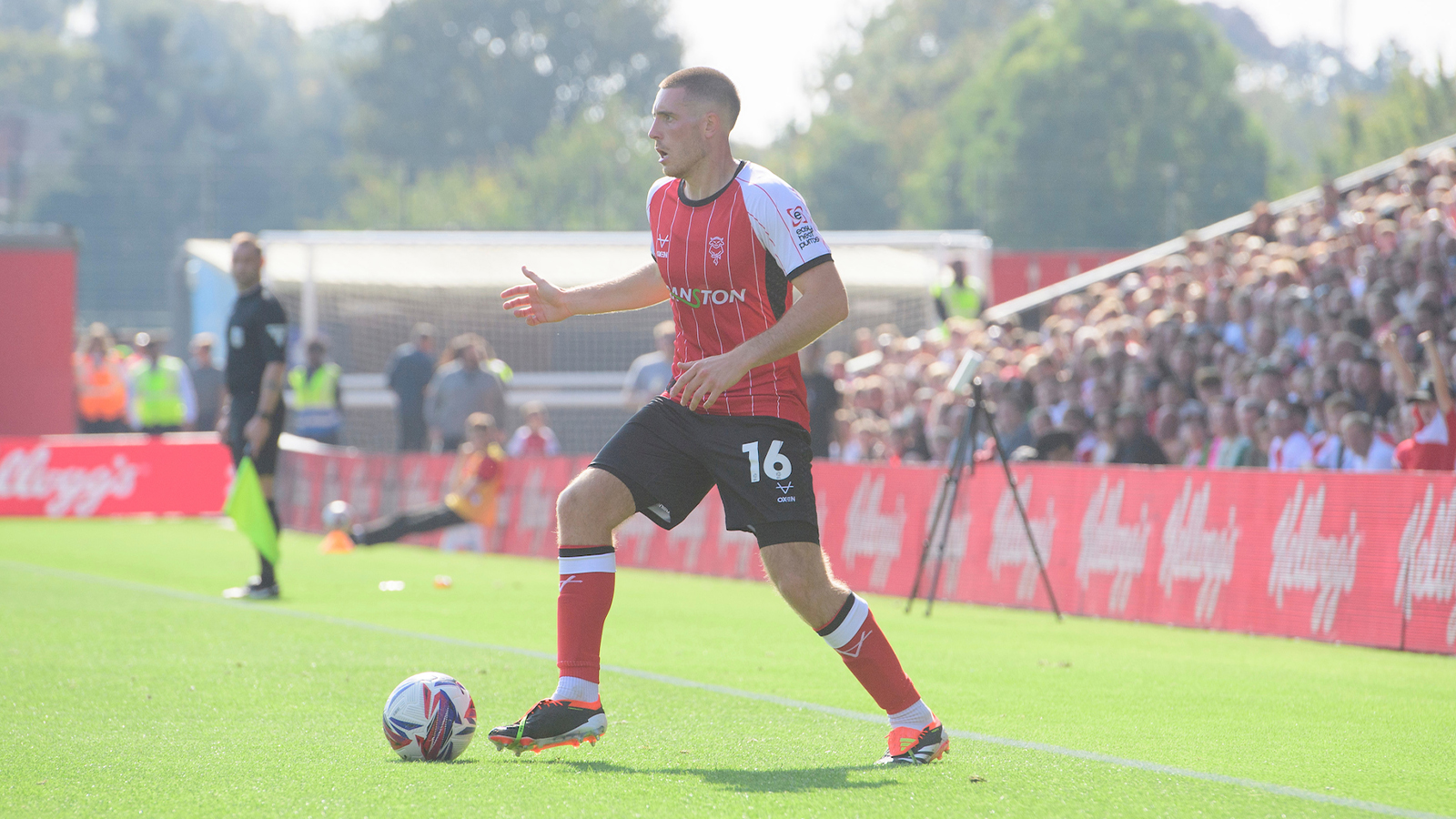 Dom Jefferies on the ball for Lincoln City against Wigan Athletic