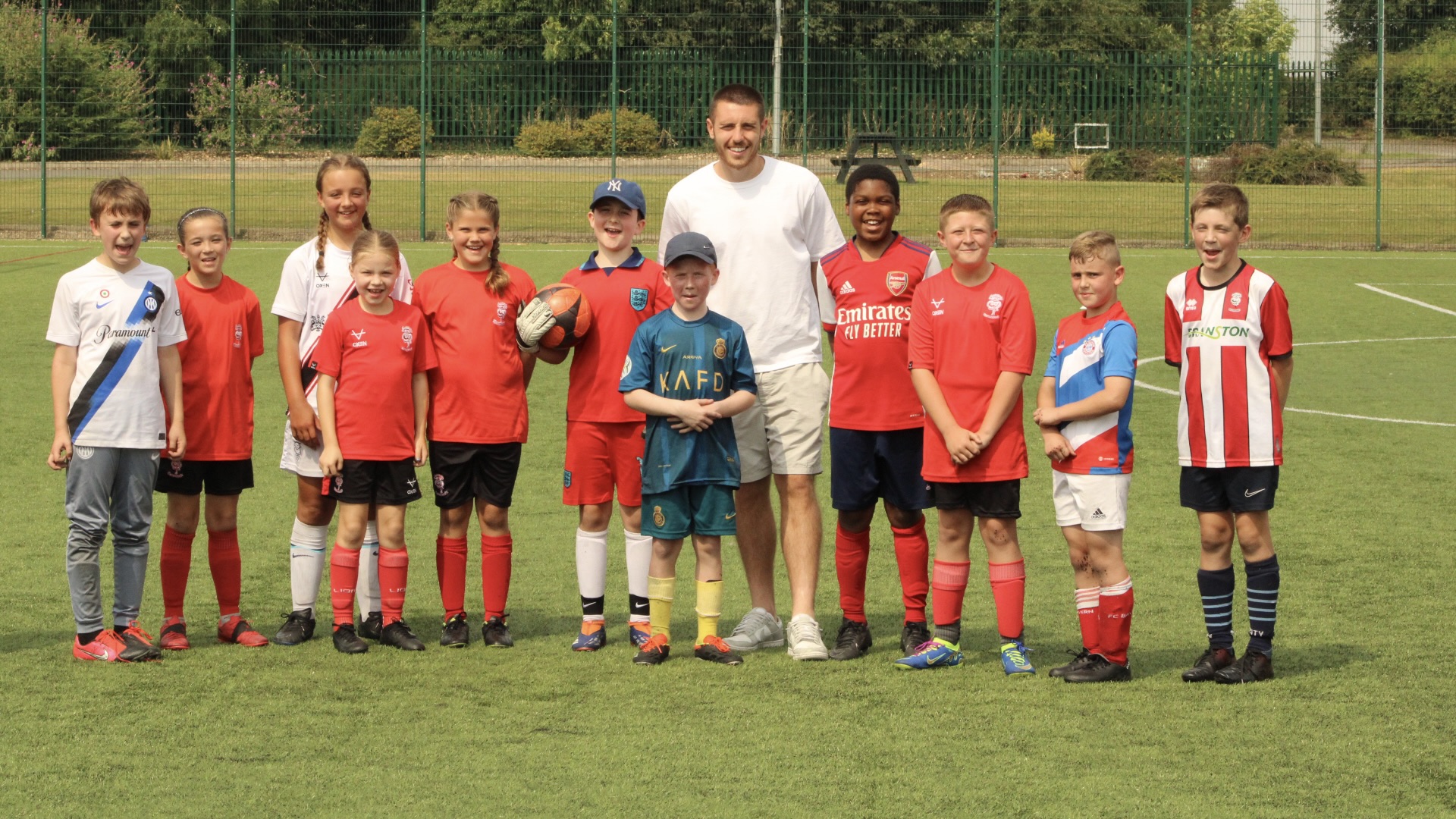 Dom Jefferies with kids at the summer masterclass.