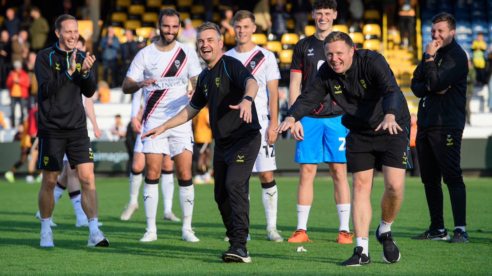 City celebrate their 2-0 away win at Cambridge United