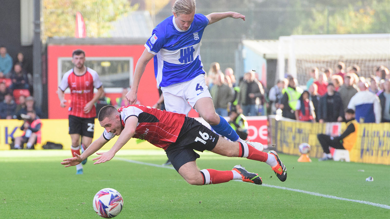 Dom Jefferies is brought down during the Imps' home game against Birmingham City