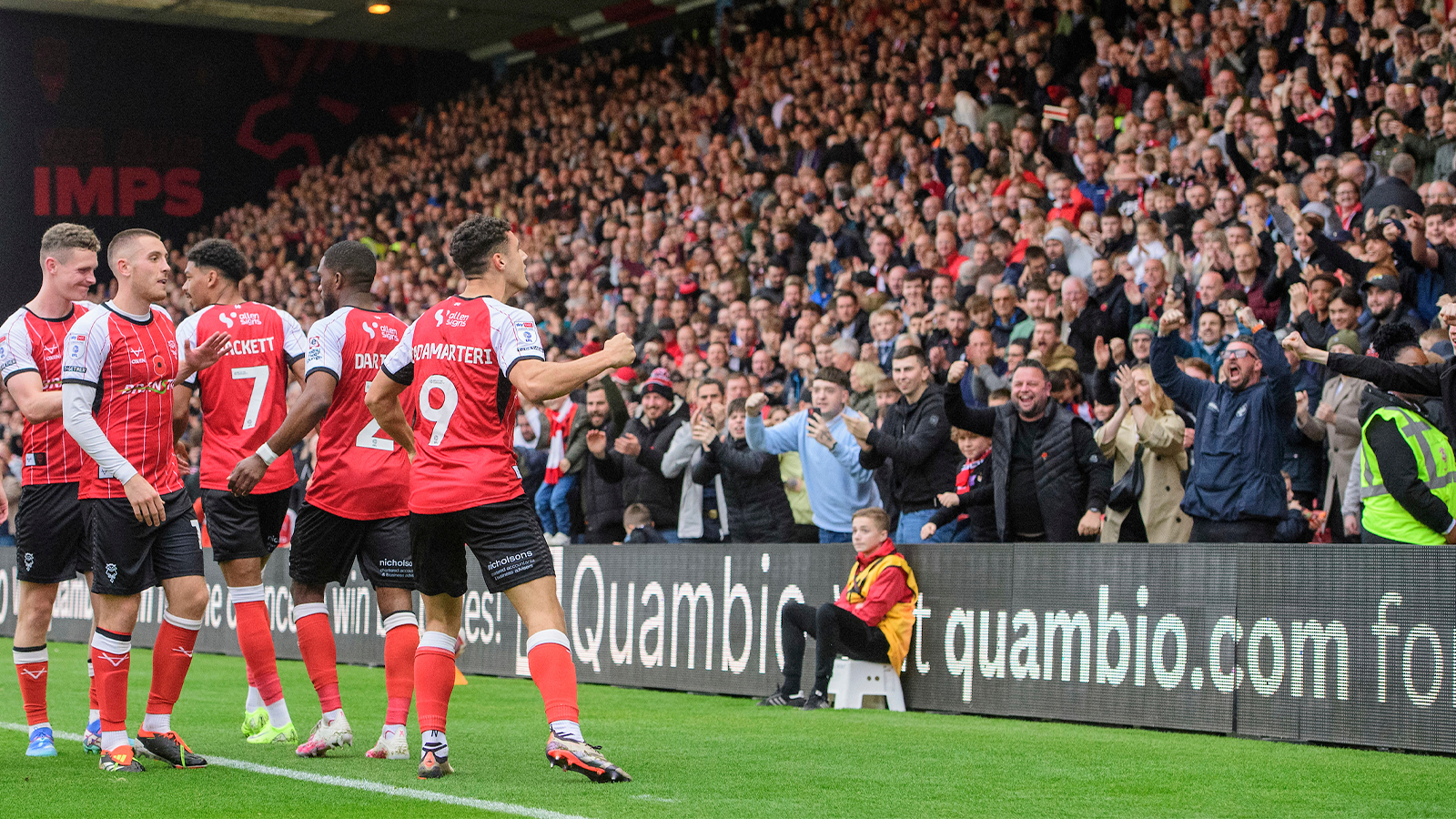 City celebrate Bailey Cadamarteri's winner against Stockport County