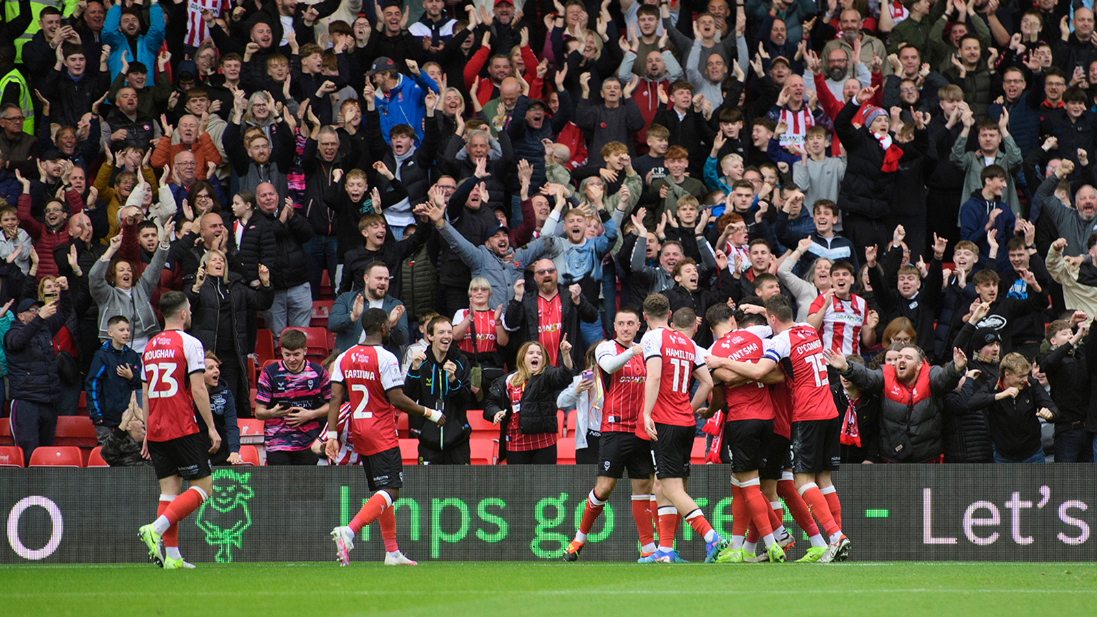 City celebrate their winner against Stockport County in front of the GBM Stand.