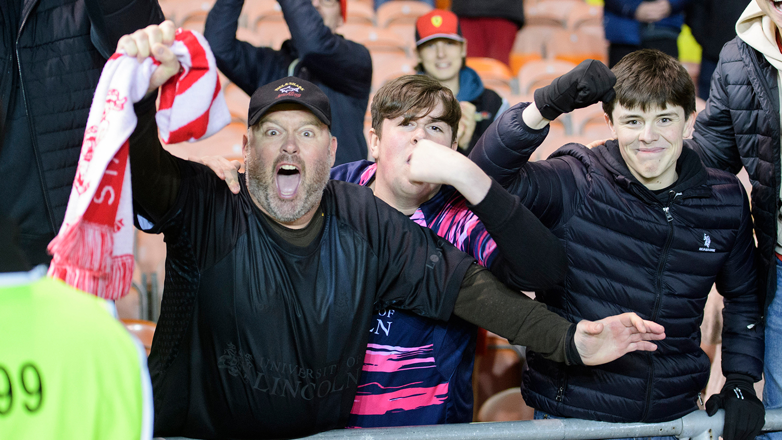 Supporters celebrate Lincoln City's late equaliser at Blackpool