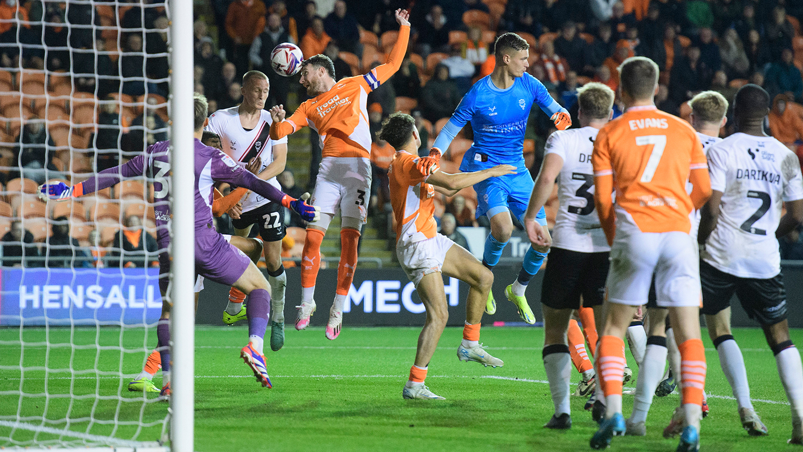 Tom Hamer heads in the equaliser for Lincoln City at Blackpool