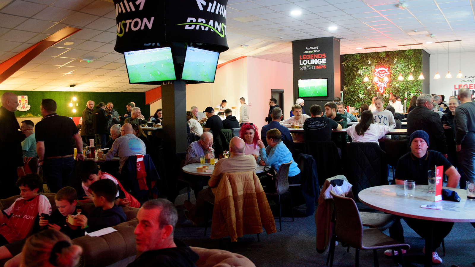 Supporters enjoy hospitality in the Branston Legends Lounge at Lincoln City's game against Birmingham City