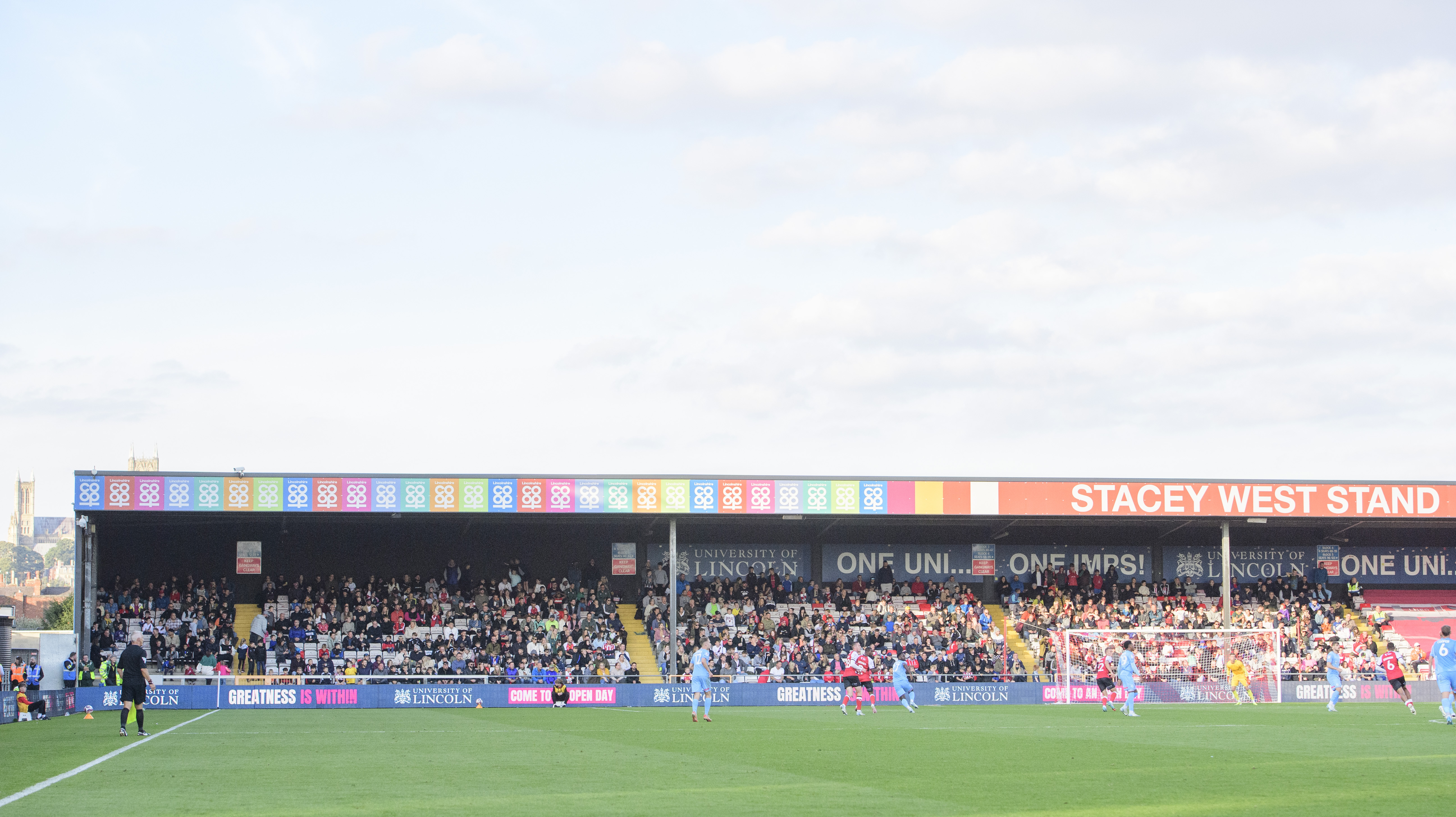 A wide image of the Stacey West Stand at the LNER Stadium. The stand is full with 900 children, parents and coaches from grassroots teams.