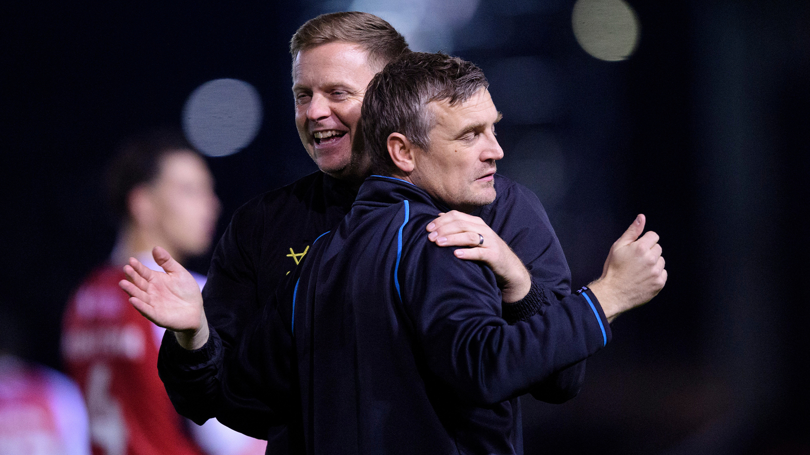 Tom Shaw and Michael Skubala celebrate at full-time of the win over Northampton