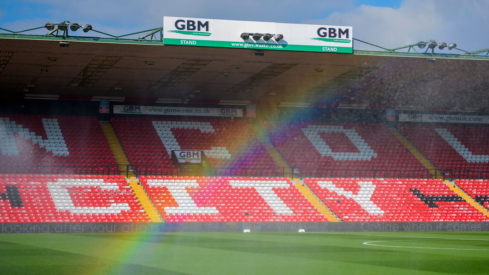 A rainbow forms at the LNER Stadium