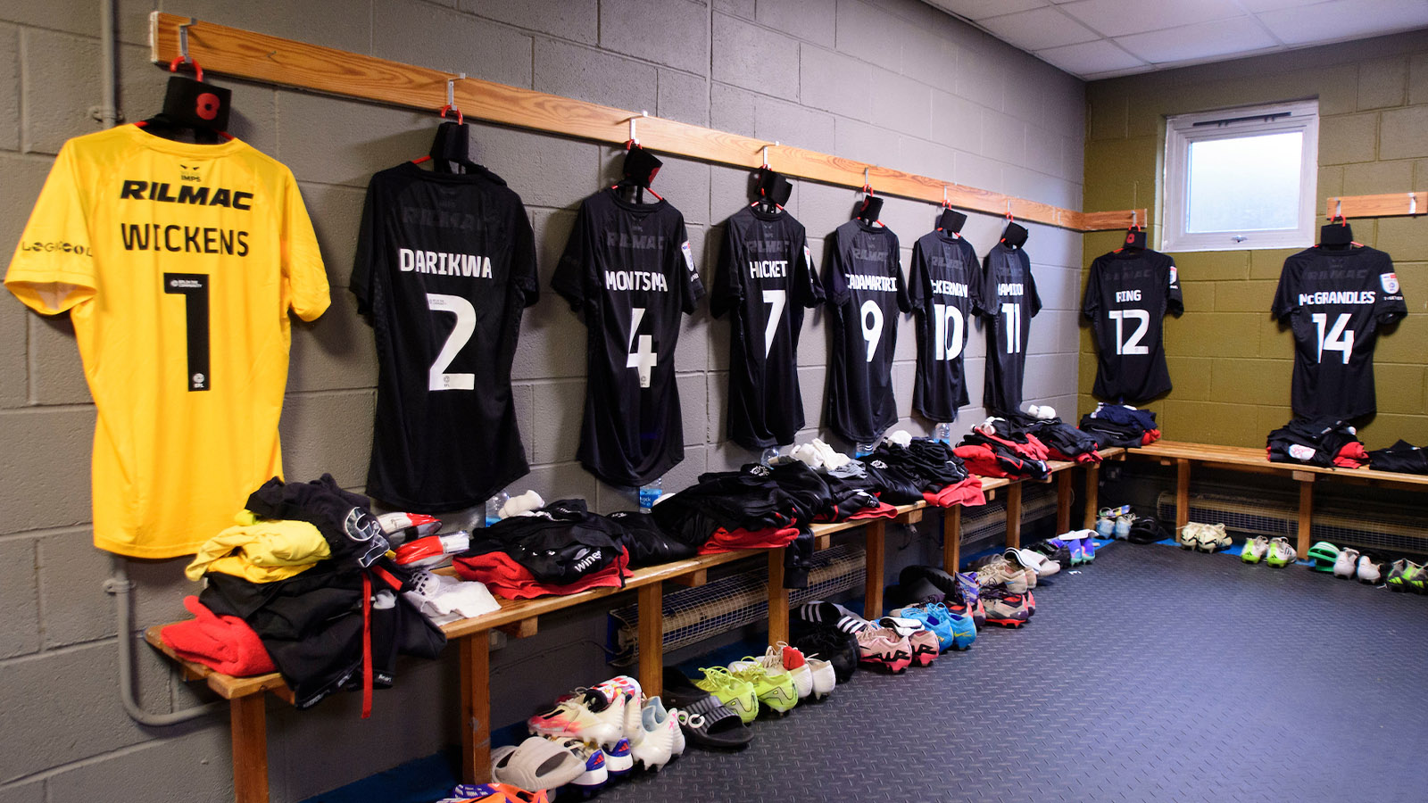 Lincoln City's kits hung up in the changing room at Bristol Rovers' Memorial Stadium