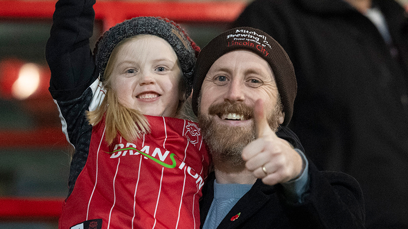 City fans supporting their team at Wrexham