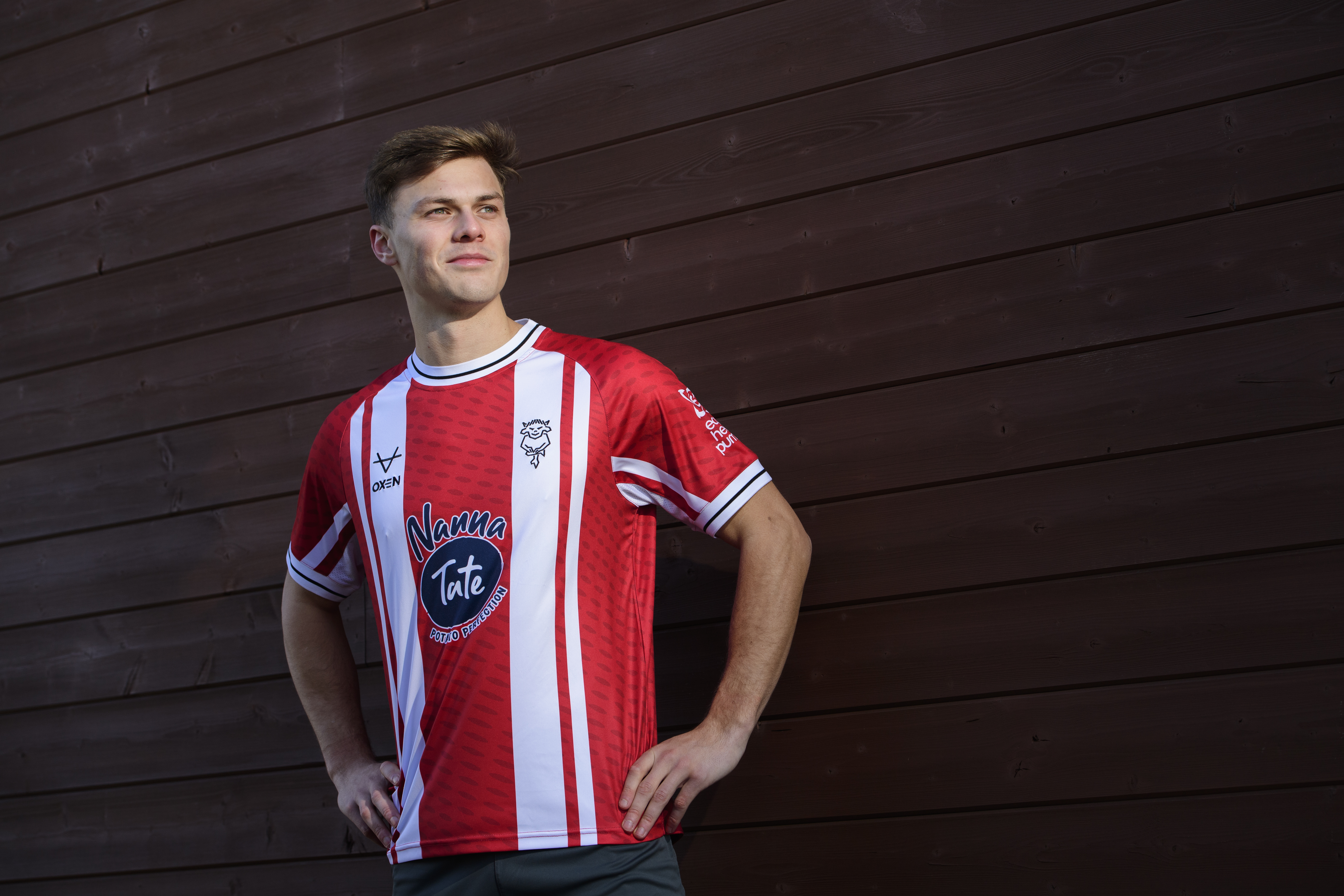 Erik Ring wears the special edition Lincoln City shirt.