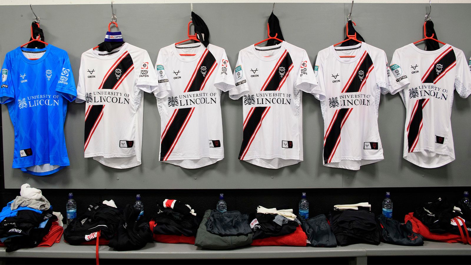 The City shirts hung up in the away changing room at Morecambe