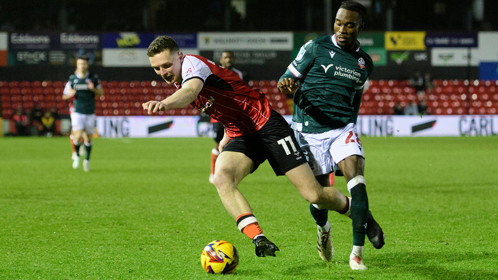 A match action image from Lincoln's home game against Bolton Wanderers