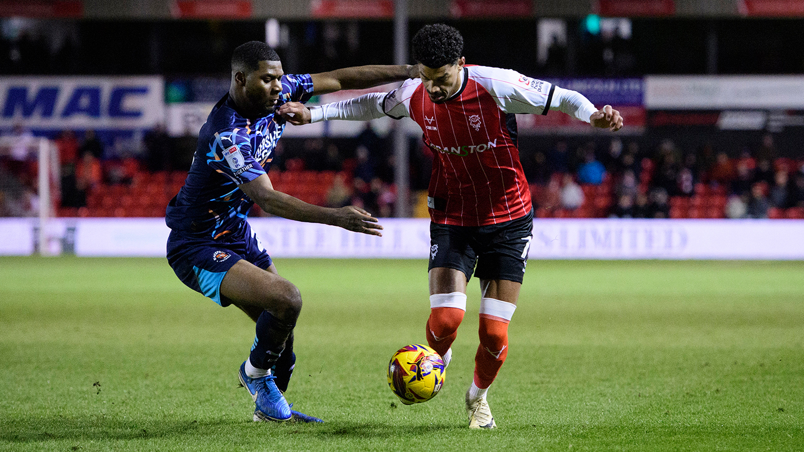 A match action image from City's home game against Blackpool at the LNER Stadium.