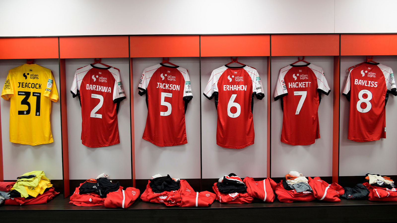 Shirts hung up in the Lincoln City changing room