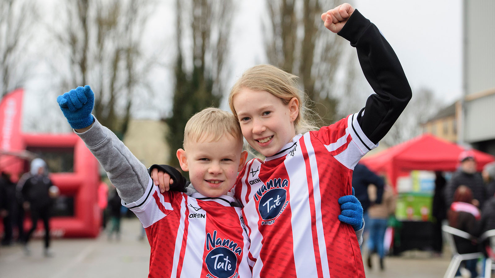 A pair of young City fans outside the stadium