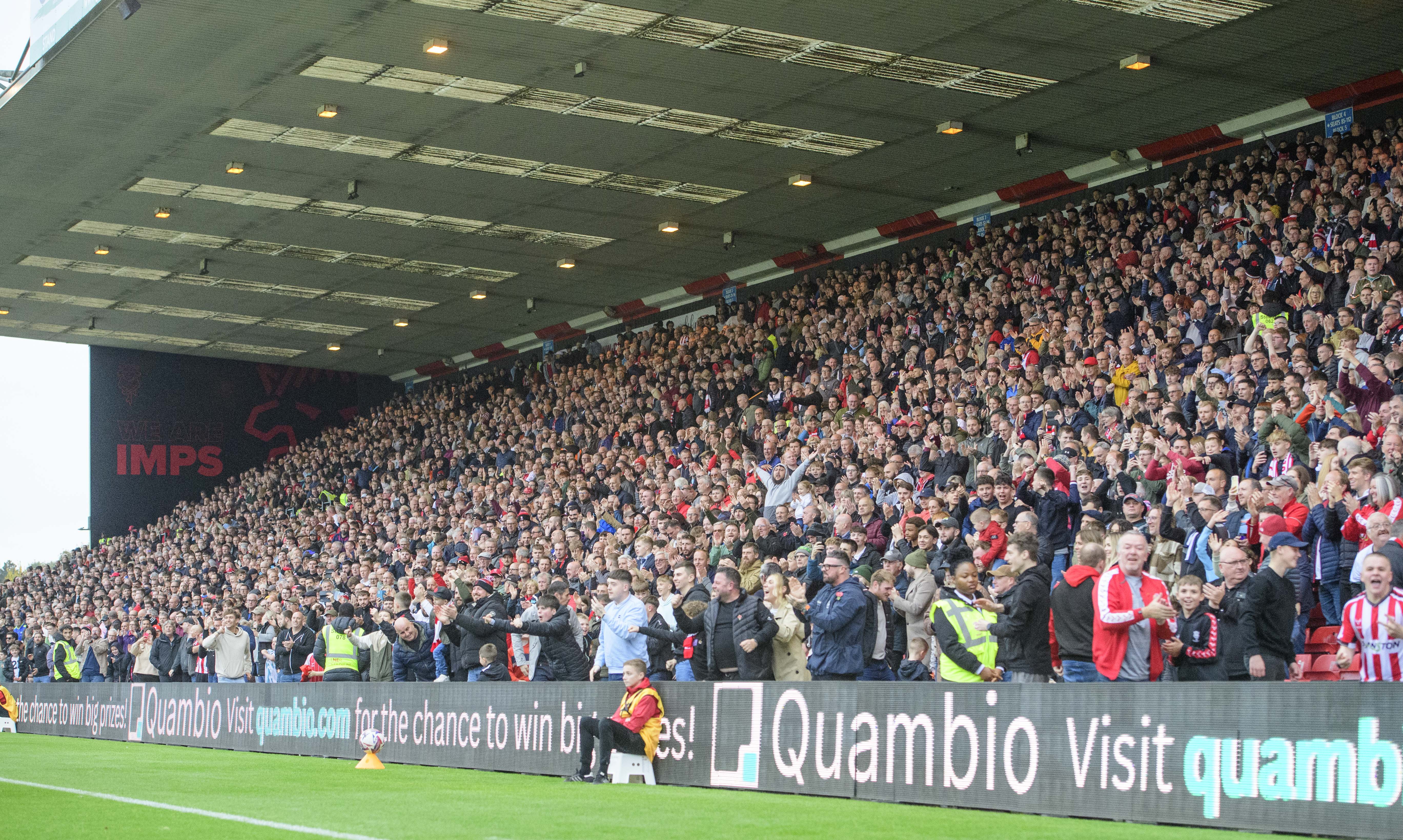 Lincoln City fans celebrate.