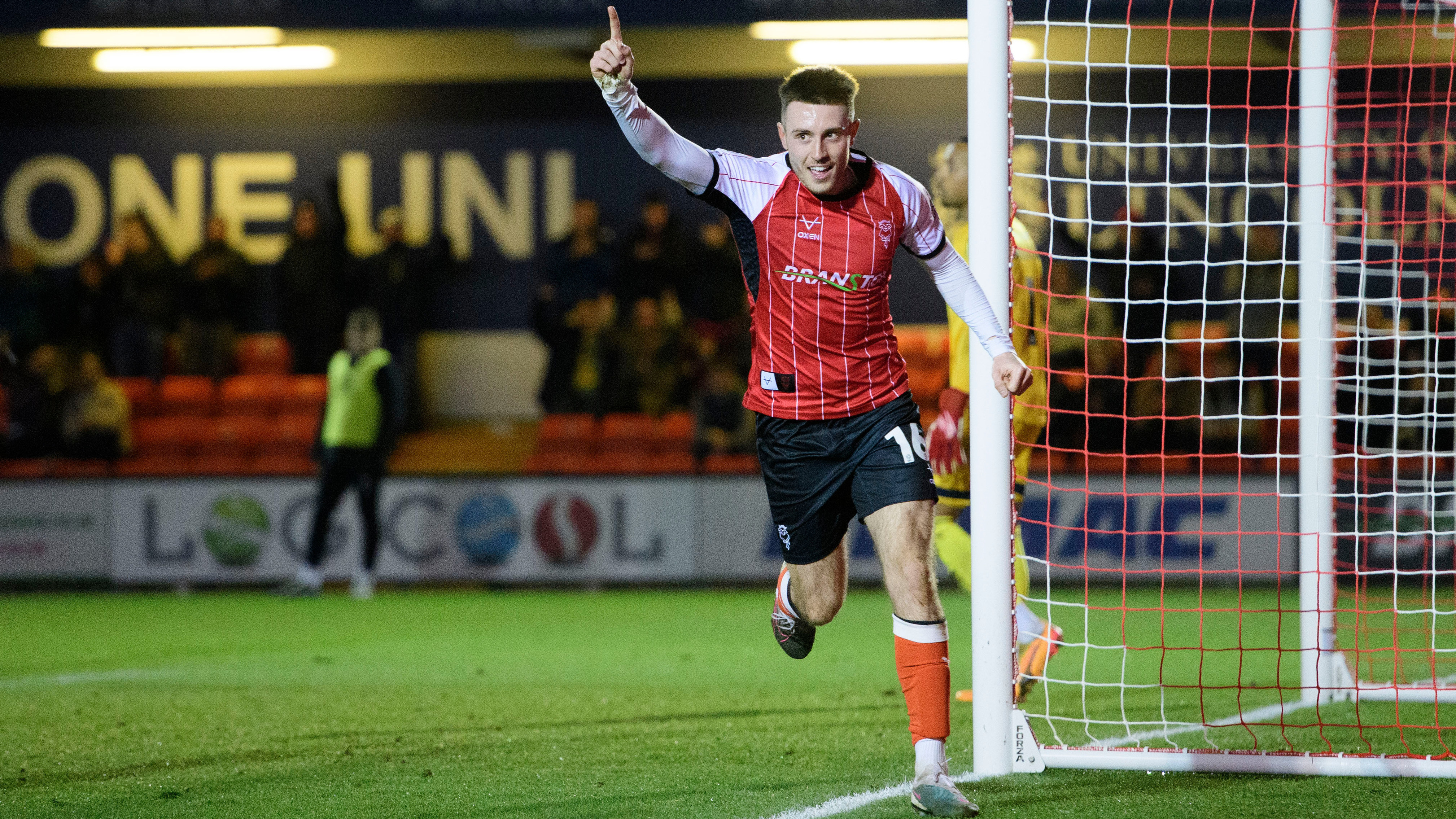 Dom Jefferies celebrates City's third goal against Crawley Town