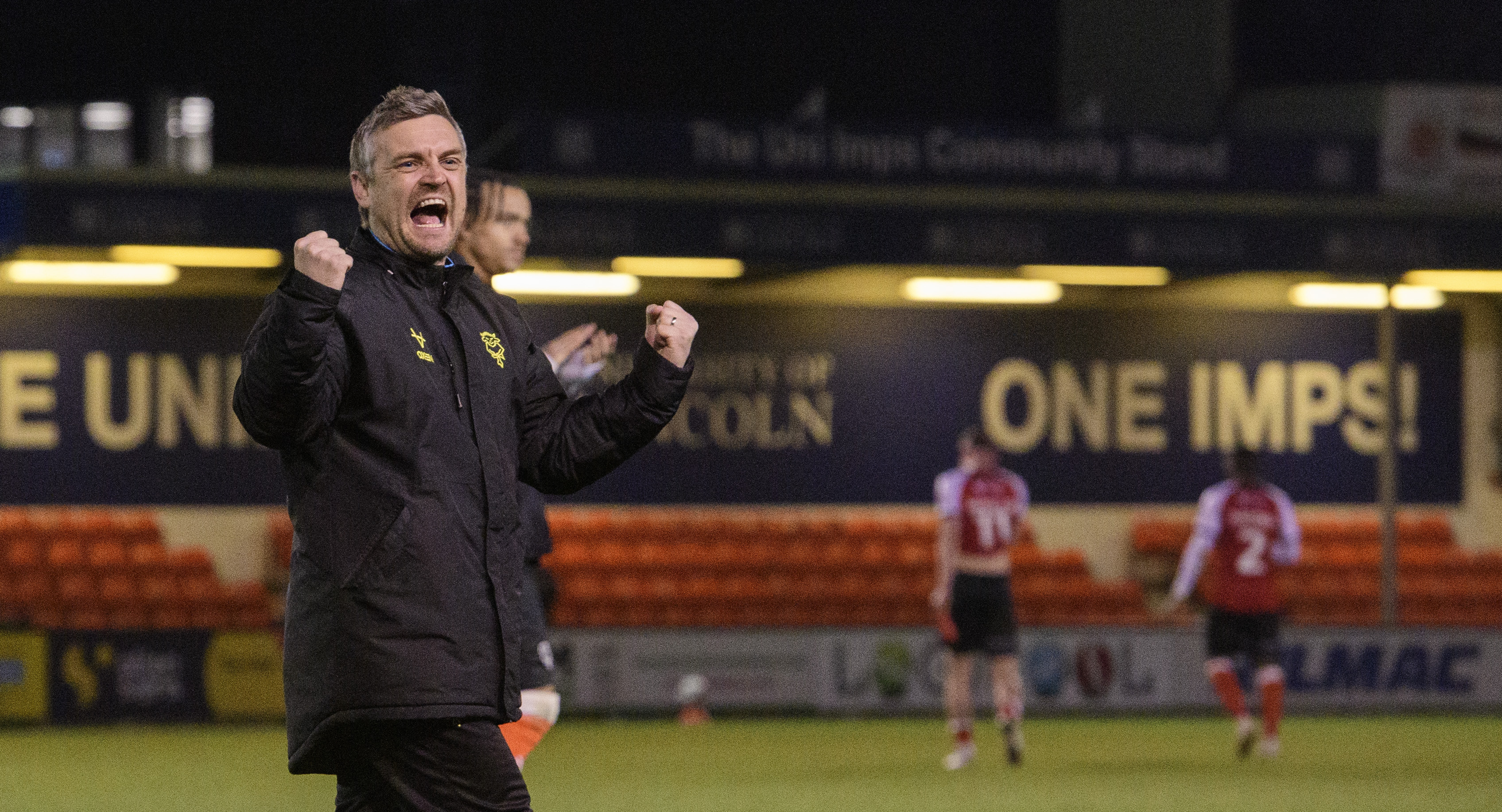 Michael Skubala celebrates Lincoln City's win