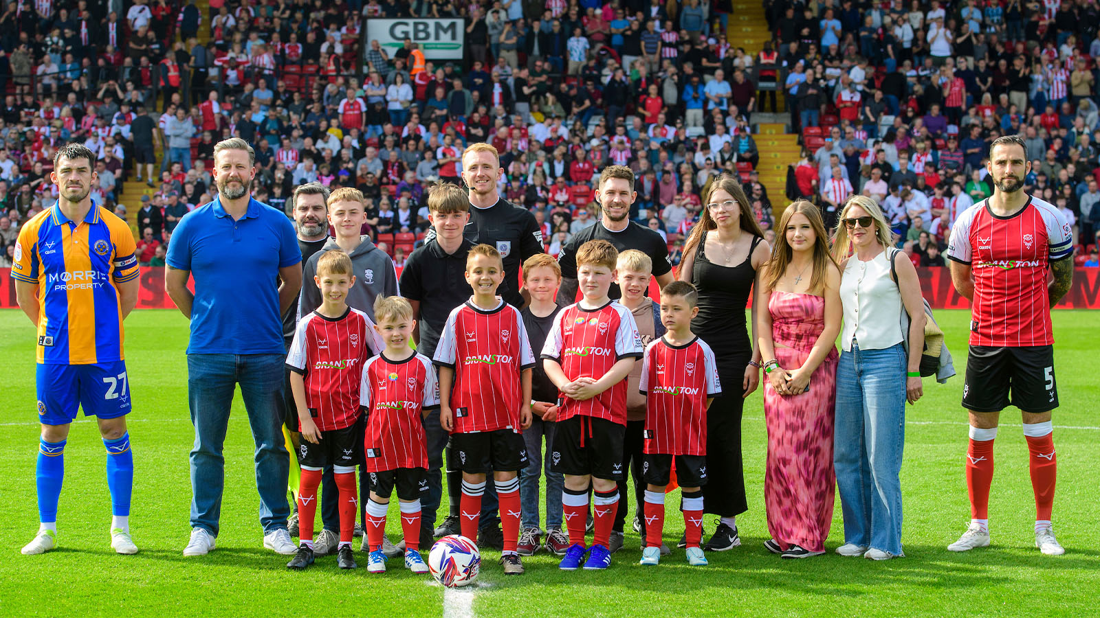The mascots line up before City's home game against Shrewsbury Town