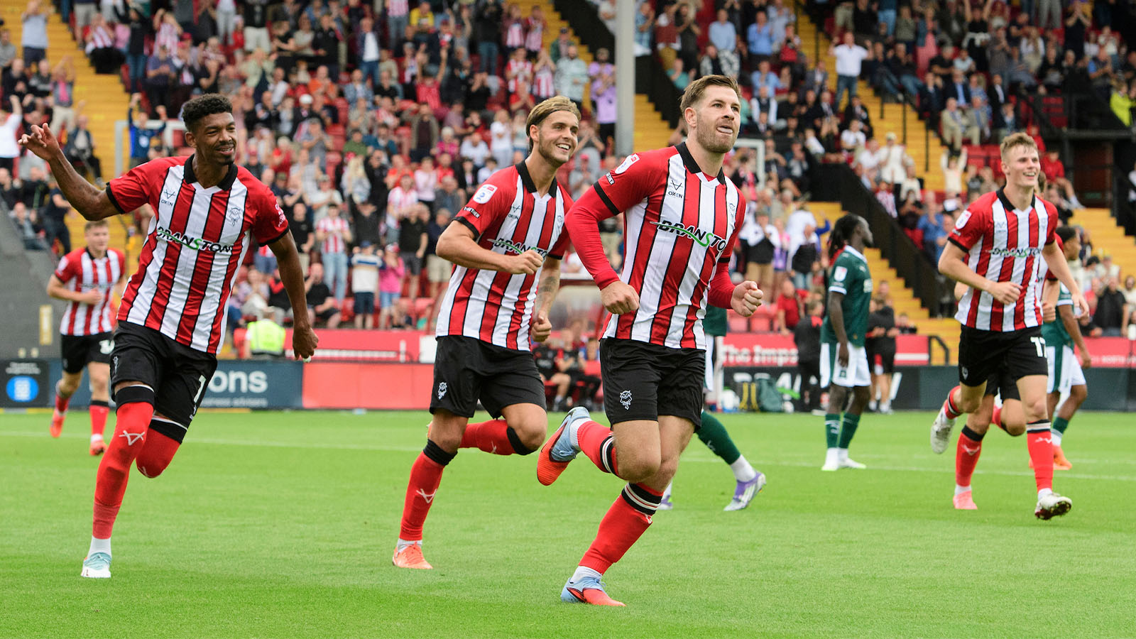 City celebrate one of James Collins' goals against Plymouth Argyle