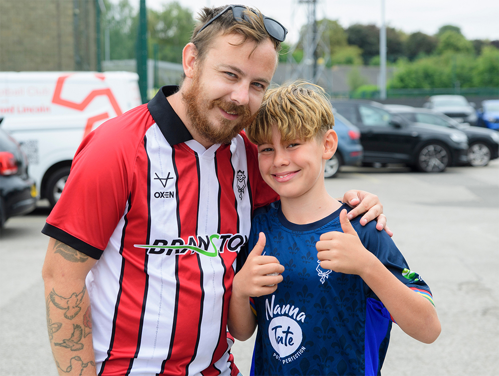 Fans in the Fan Village at the LNER Stadiium