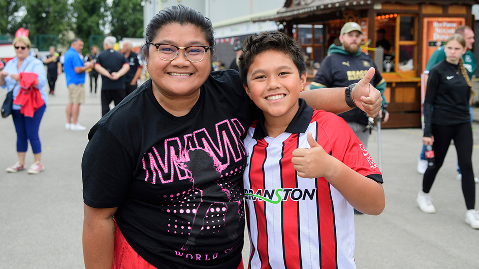 Fans in the Fan Village at the LNER Stadiium
