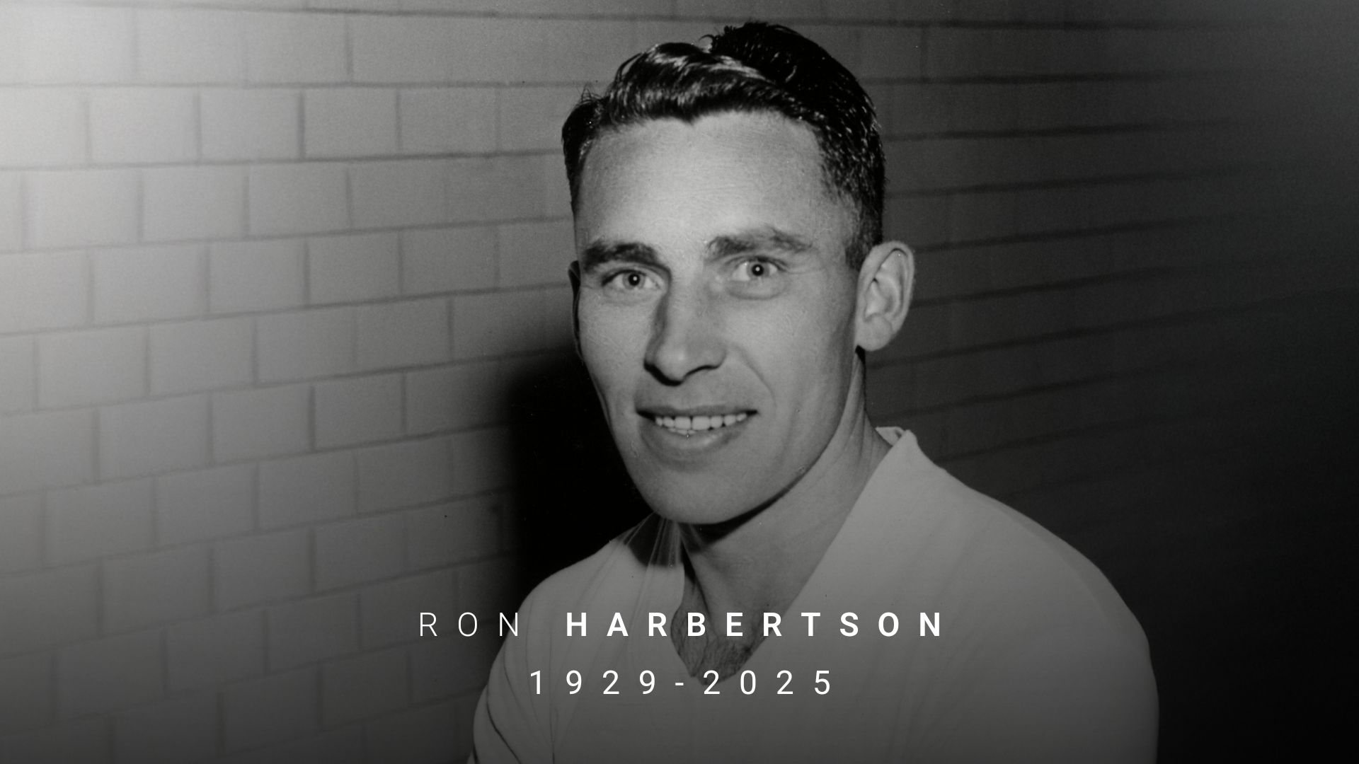A black and white headshot image of a man. Text reads: "Rob Harbertson 1929-2025"
