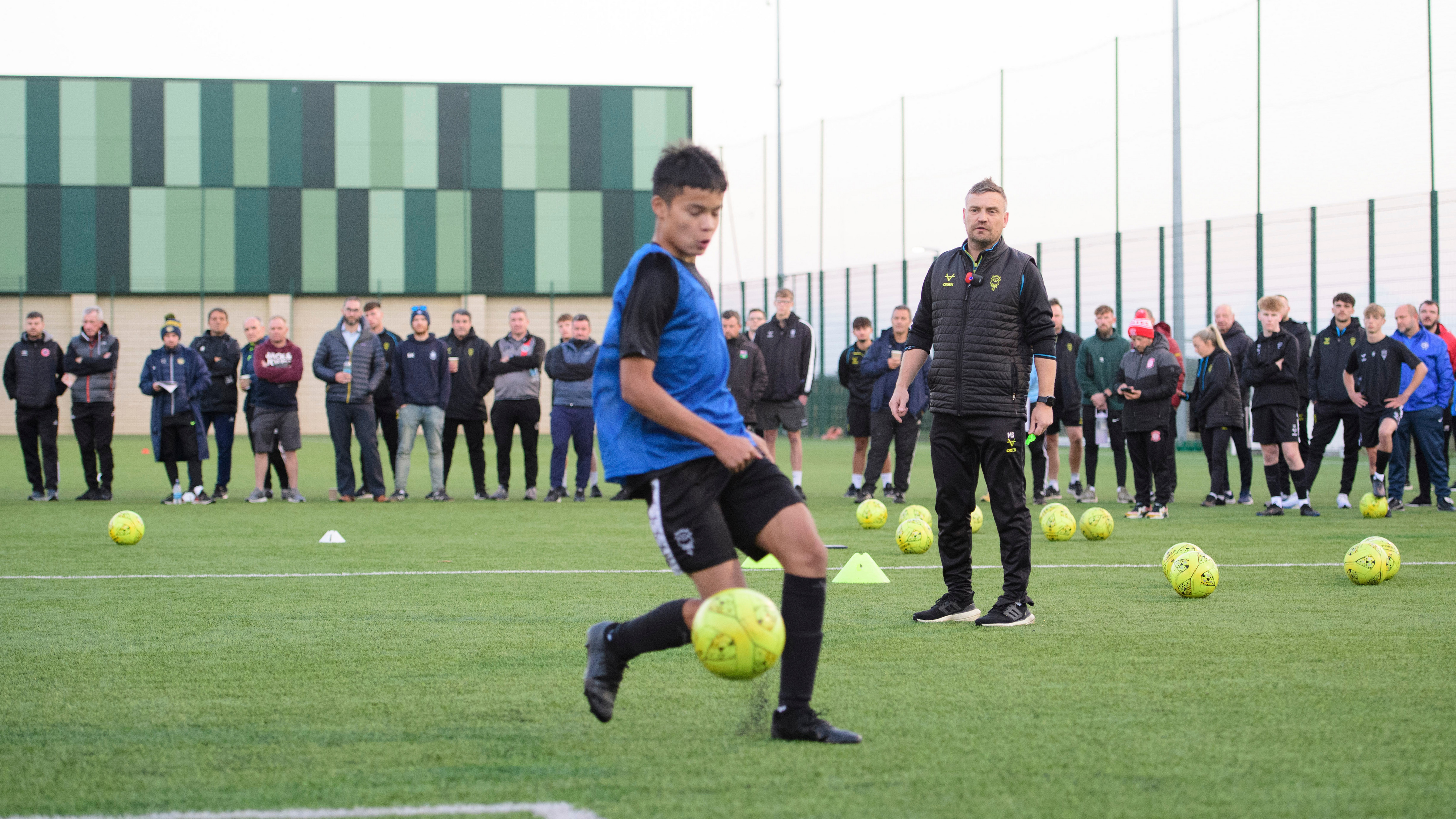 Lincoln City head coach Michael Skubala oversees a training session