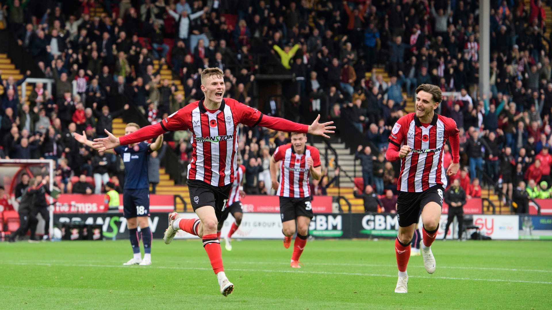 Rob Street of Lincoln City celebrates scoring the opening goal during the EFL Sky Bet League One match between Lincoln City and Stevenage at LNER Stadium, Lincoln.