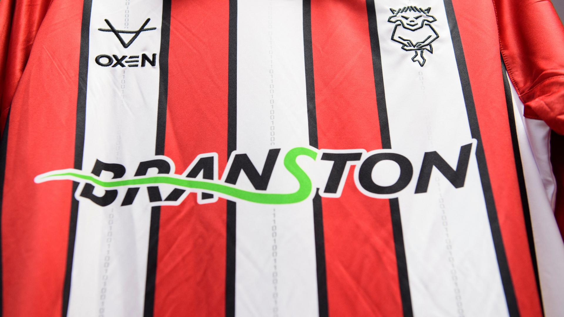 The EFL Sky Bet League One sleeve patch on a Lincoln City home shirt in the changing room prior to the EFL Sky Bet League One match between Lincoln City and Exeter City at LNER Stadium, Lincoln.