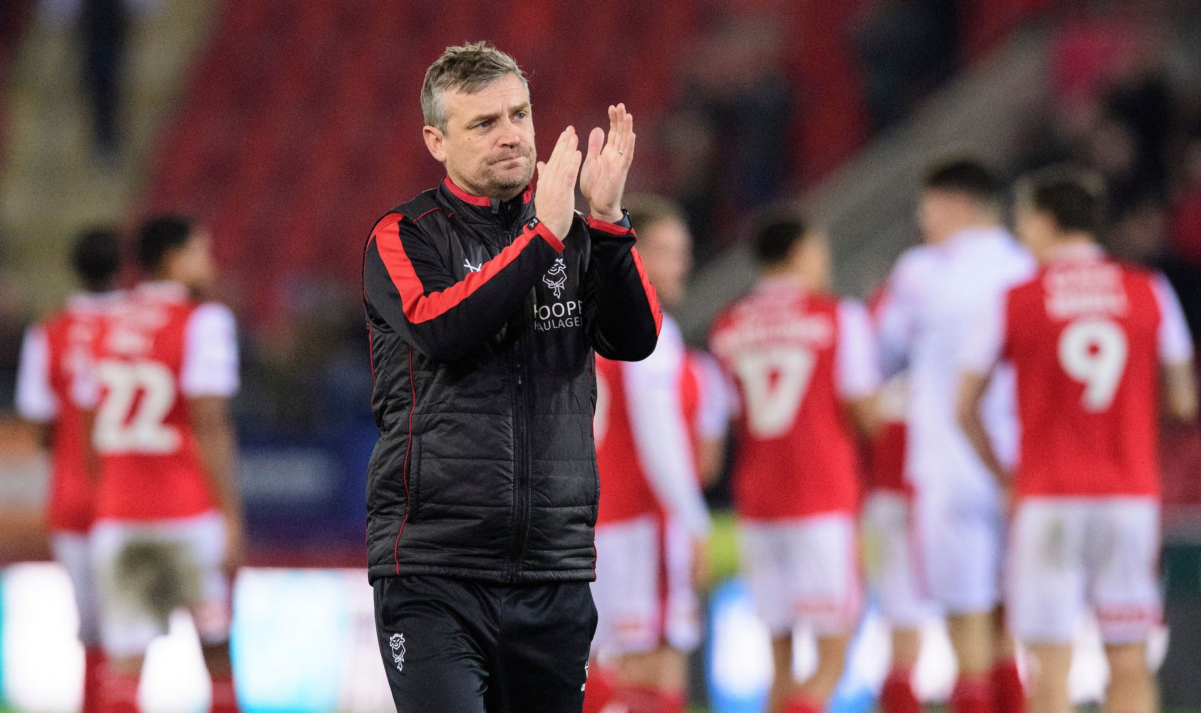 Michael Skubala, head coach of Lincoln City applauds the fans at the final whistle following the EFL Sky Bet League One match between Rotherham United and Lincoln City at The AESSEAL New York Stadium, Rotherham.