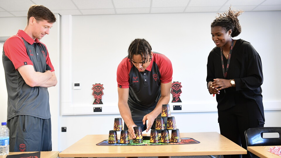 Conor McGrandles and Jovon Makama inside Co-op Community Hub.