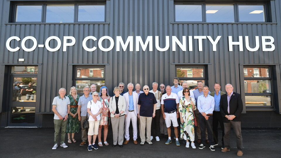 Stakeholders of the Co-op Community Hub outside the facility.