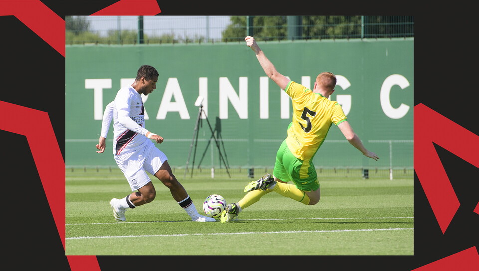 Ethan Erhahon tries to get the ball past a Norwich City defender