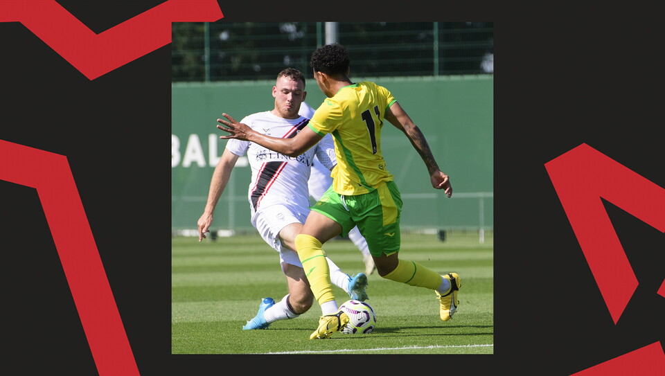 Ben House tackles for the ball