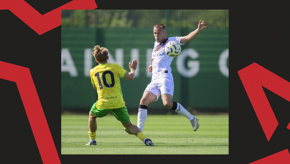 Tom Hamer tackles for the ball