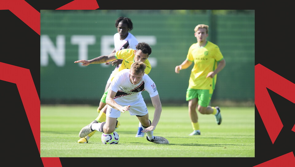 Rob Street tackles for the ball