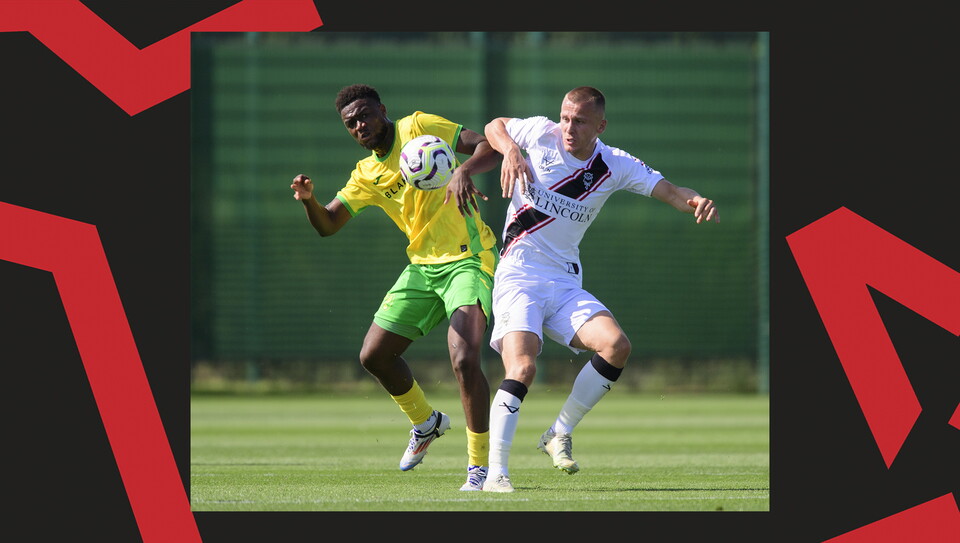 Tom Hamer tackles for the ball
