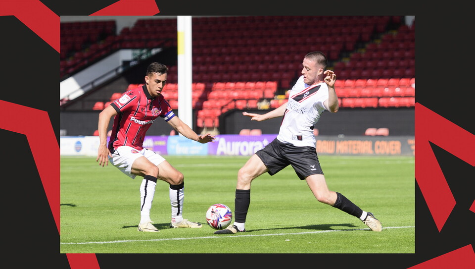 An action shot of City's 2-1 win at Walsall.