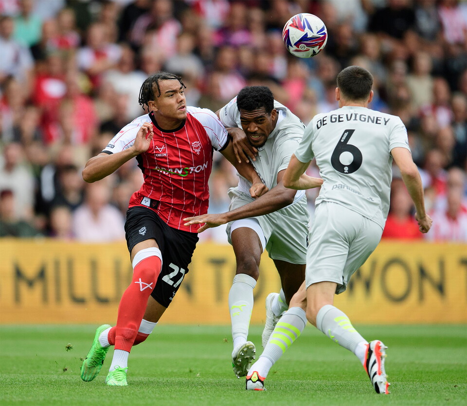 Jovon Makama battles for the ball during the home game against Barnsley