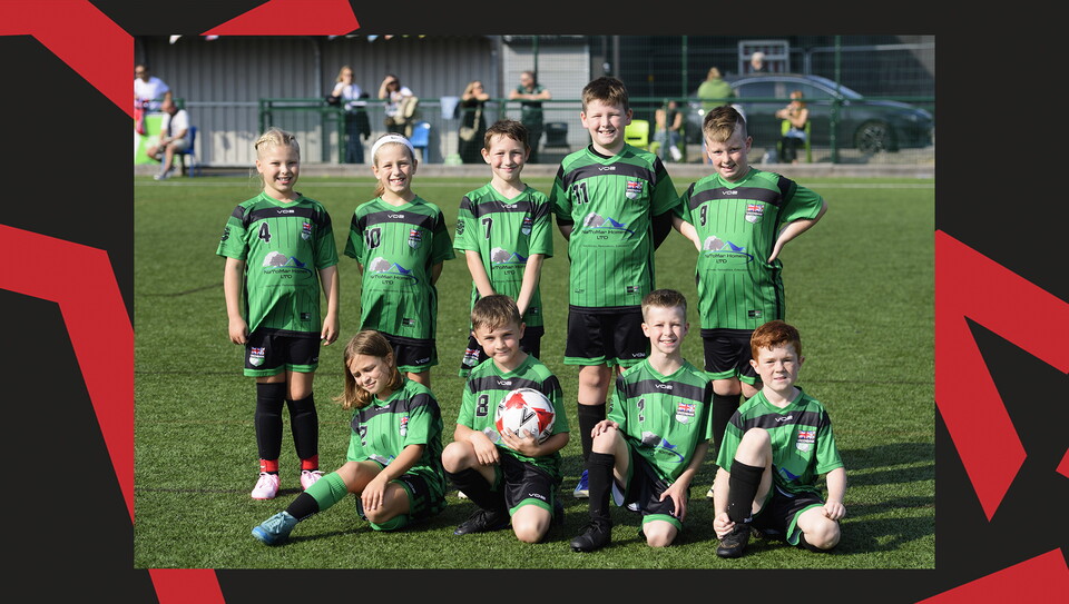 Young fans enjoying a matchday experience at Lincoln City's home game against Wigan Athletic.