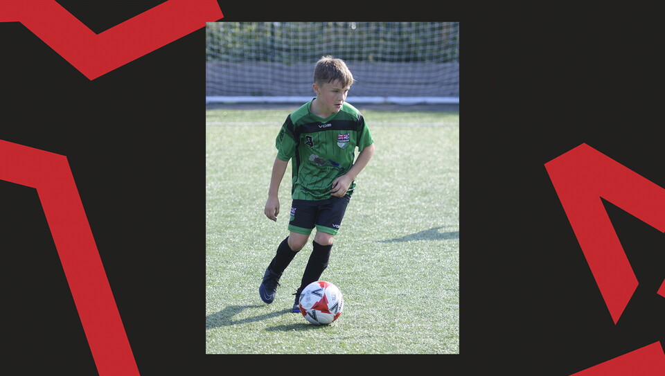 Young fans enjoying a matchday experience at Lincoln City's home game against Wigan Athletic.